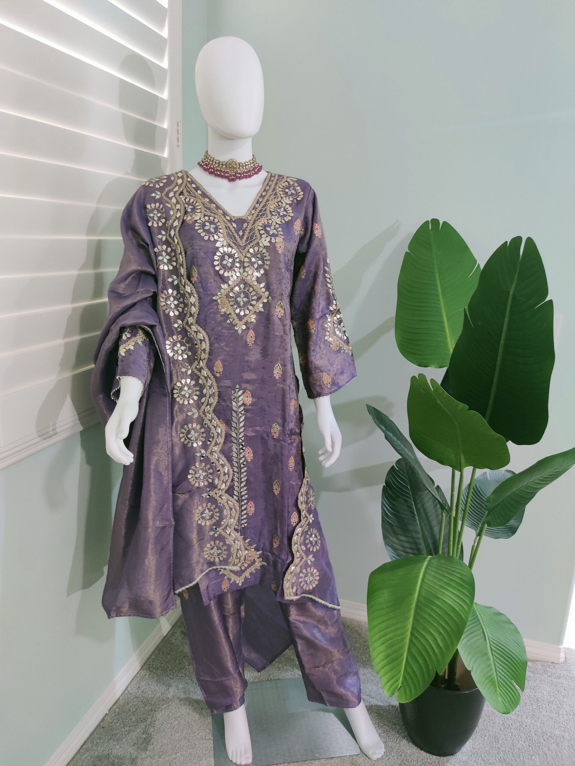 Regal Lavender straight kurta set with intricate gold-silver embroidery — celebration ready.