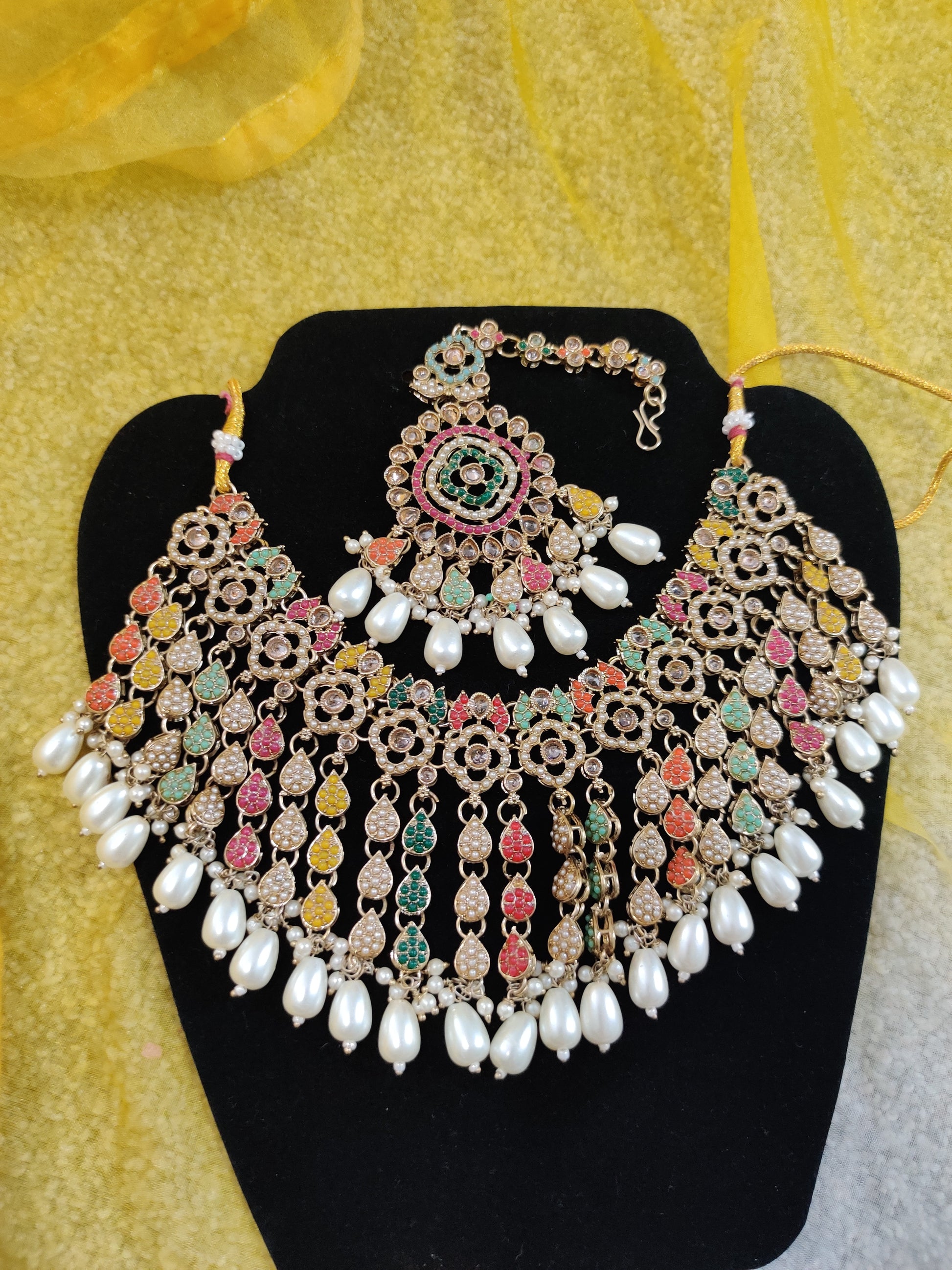 Heavy Gold-Toned Necklace Set with Maang Tikka and Earrings