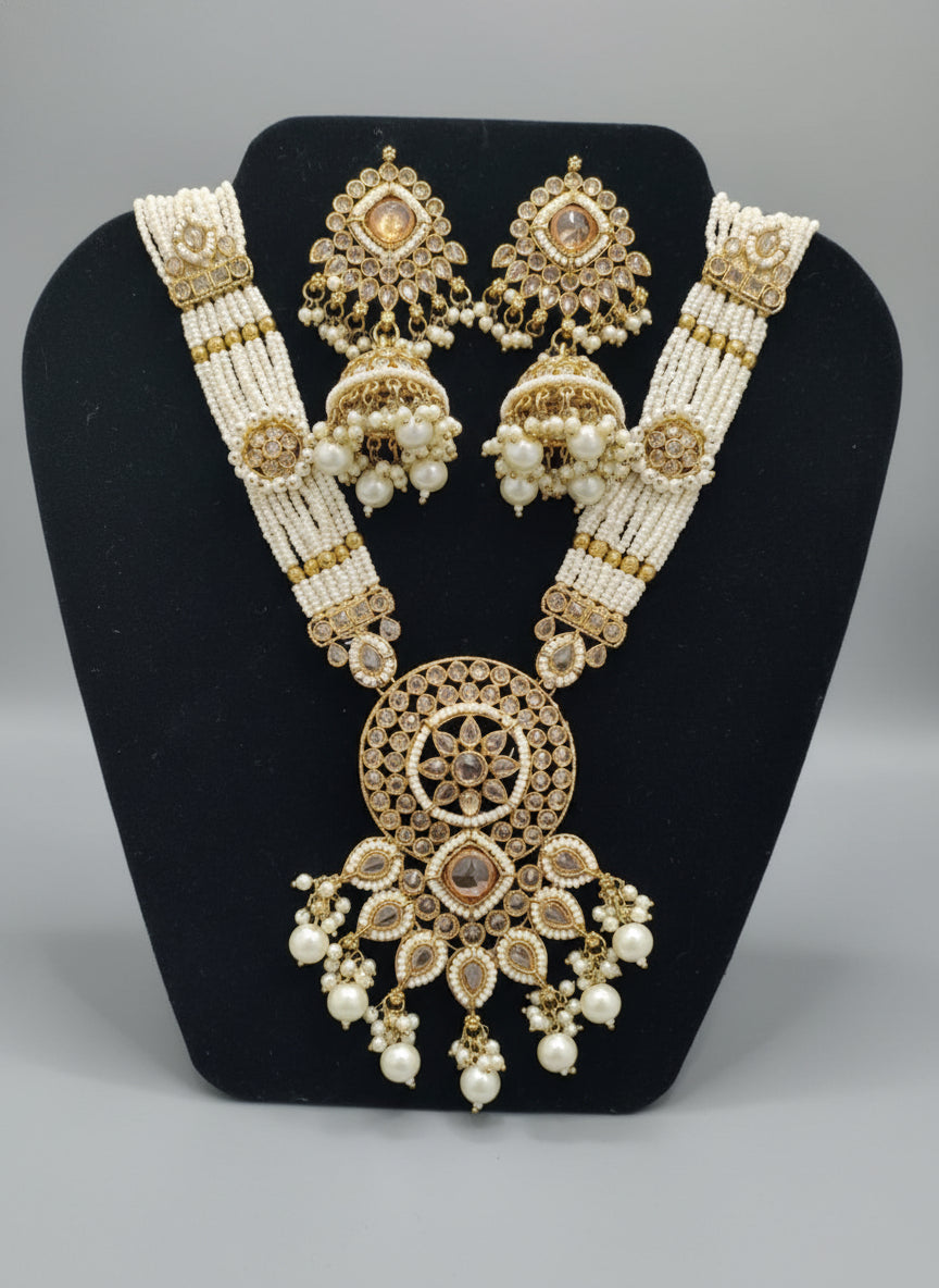 "Rangmahal Radiance” – Where Heritage Blooms in Gold and Pink