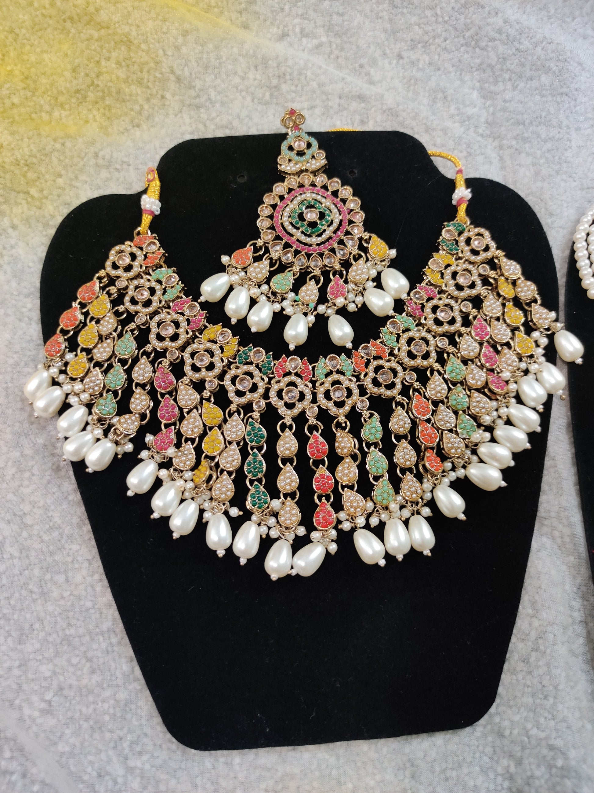 Heavy Gold-Toned Necklace Set with Maang Tikka and Earrings
